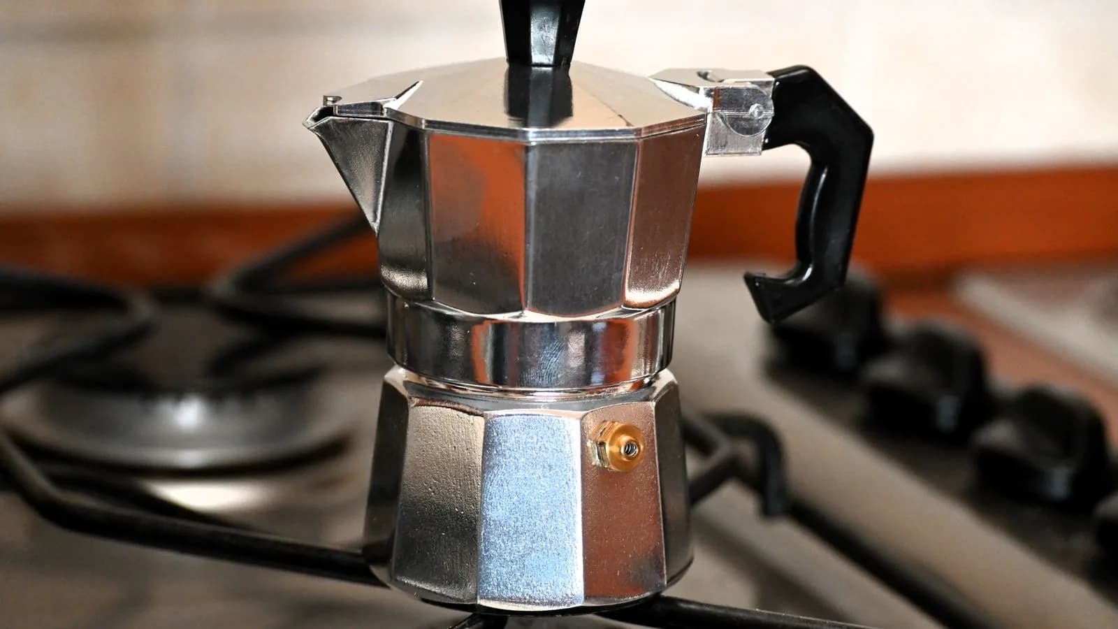 Moka pot on a gas stove in a home kitchen