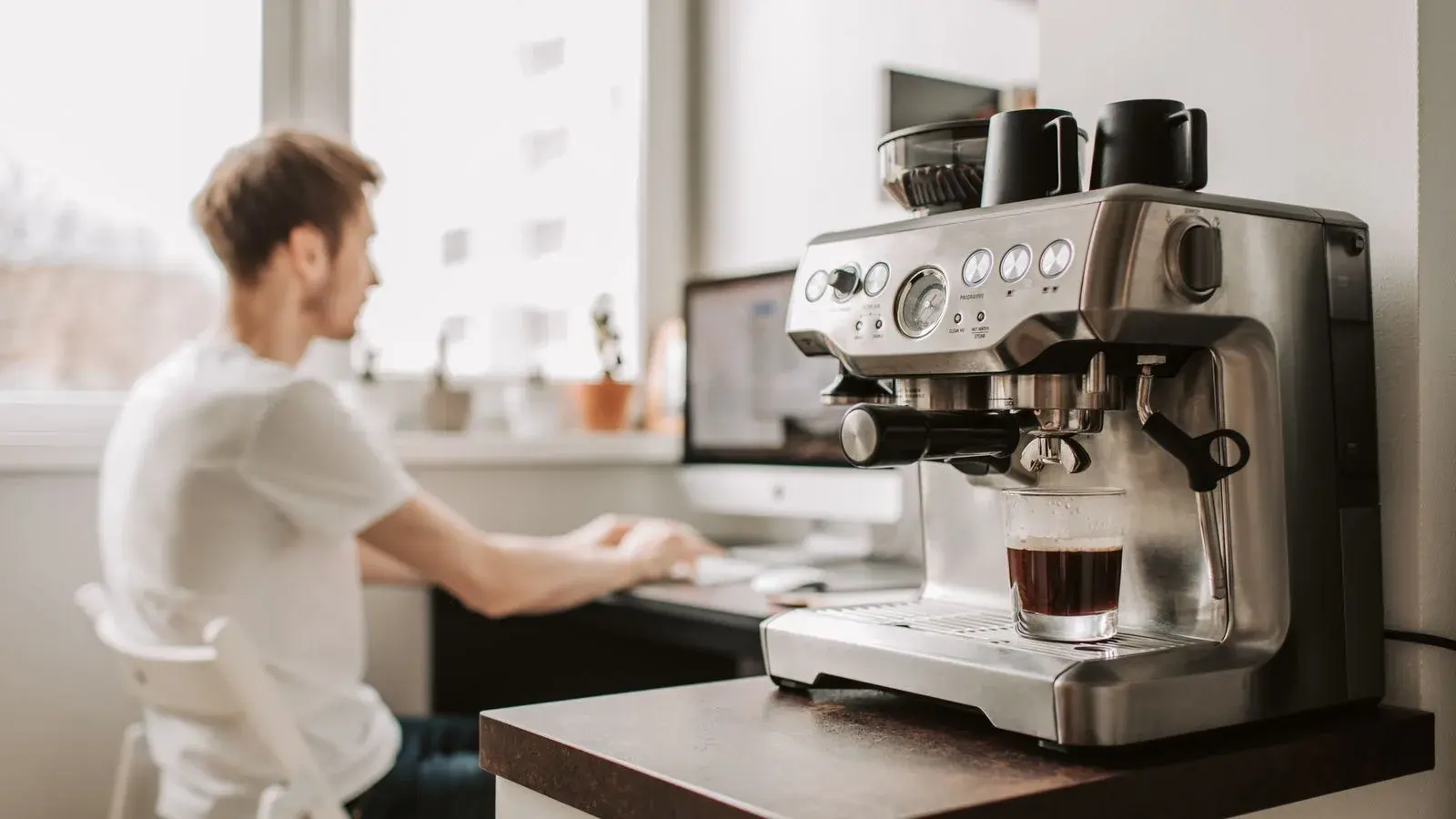 Photo by Vlada Karpovich on Pexels An espresso machine with a built-in grinder on a kitchen counter