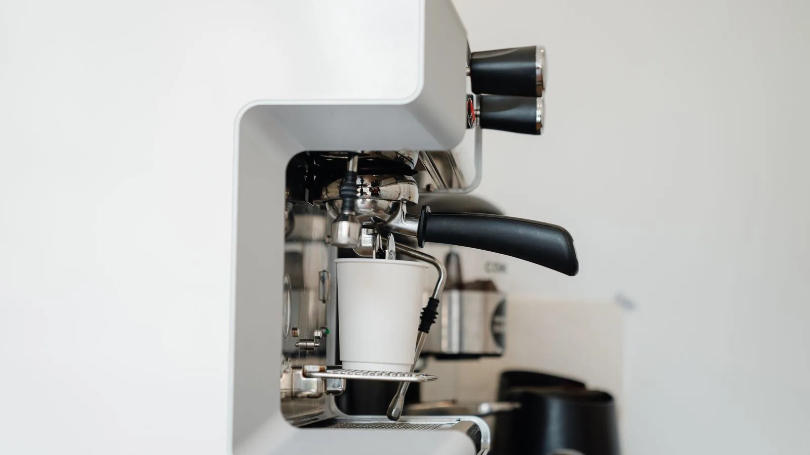 An espresso machine with its portafilter in place